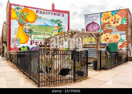 Philadelphia, Pennsylvania - February 17, 2019: Beautiful buildings with colorful murals in South Philadelphia. Stock Photo