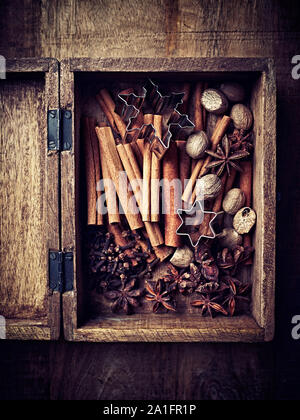 Spices for Christmas baking in a wooden box Stock Photo