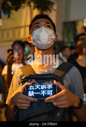 Wanchai, Hong Kong. 26 September, 2019. Demonstrators outside  the Queen Elizabeth Stadium on Thursday where Chief executive Carrie Lam was holding a dialogue with randomly selected representatives from the public to alleviate fears about the now dropped anti extradition law. Iain Masterton/Alamy Live News. Stock Photo