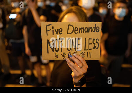 Wanchai, Hong Kong. 26 September, 2019. Demonstrators outside  the Queen Elizabeth Stadium on Thursday where Chief executive Carrie Lam was holding a dialogue with randomly selected representatives from the public to alleviate fears about the now dropped anti extradition law. Iain Masterton/Alamy Live News. Stock Photo