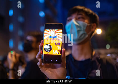 Wanchai, Hong Kong. 26 September, 2019. Demonstrators outside  the Queen Elizabeth Stadium on Thursday where Chief executive Carrie Lam was holding a dialogue with randomly selected representatives from the public to alleviate fears about the now dropped anti extradition law. Iain Masterton/Alamy Live News. Stock Photo