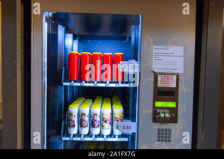 Candle vending machine in church Stock Photo