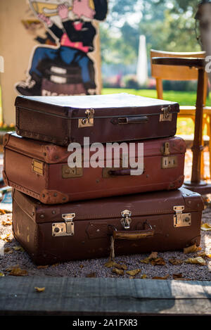 Pile of Vintage Suitcases on the French Flea Market Stock Photo