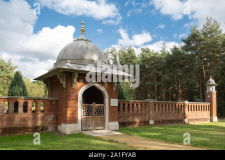 Woking Muslim Burial Ground and Peace Garden, historic war cemetery in Surrey, UK. Domed archway over entrance and ornate walls.