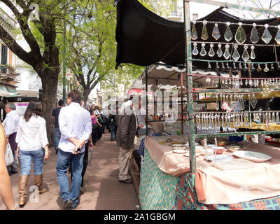 BUENOS AIRES, - SEP 30: Street market in Plaza Dorrego in San Telmo district, Buenos Aires on September 30, 2012. The city is a popular tourist destin Stock Photo