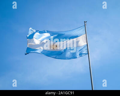 Argentina flag on a pole, with the Inca sun in the middle. Stock Photo