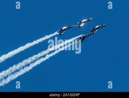 Wantagh, New York, USA - 24 May 2019: The United States Air Force Thunderbirds flying upside down during a performance at an air show. Stock Photo