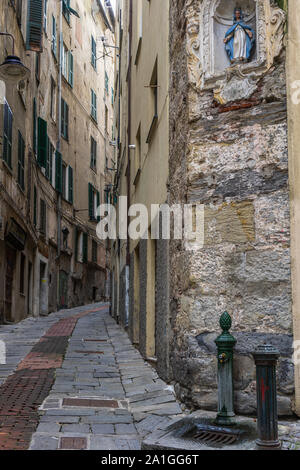 Narrow streets in the Old City of Genoa (Genova) in Liguria 2019, Italy Stock Photo