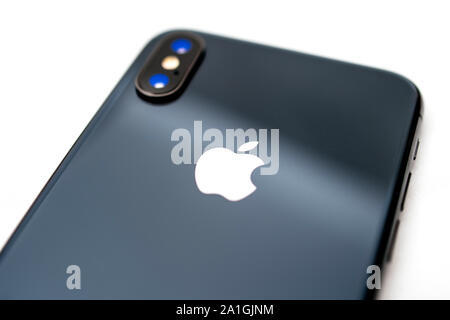 Paris, France - Sep 12, 2019: Close-up detail of the latest iphone XS dual camera - tilt-shift lens uses to focus on the Apple Computers Logotype Stock Photo