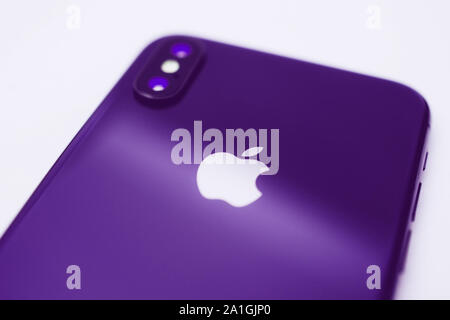 Paris, France - Sep 12, 2019: latest iphone XS dual camera - tilt-shift lens uses to focus on the Apple Computers Logotype purple color Stock Photo