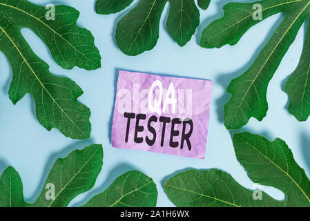 Word writing text Qa Tester. Business photo showcasing Quality assurance of an on going project before implementation Stock Photo
