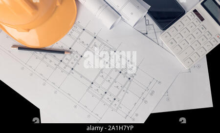 Architect, engineer concept, Represents the working style of architects, engineers With construction drawings Stock Photo