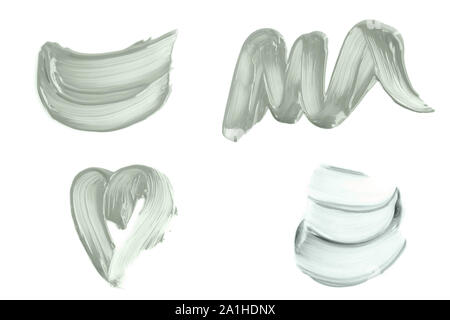 Set of abstract brush strokes toned tranquil mint green color isolated on white. Stock Photo