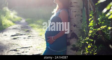 Pregnant, pregnancy, motherhood, mother, maternal, newborn, newbaby, childbirth, baby, body, belly, stomach Stock Photo