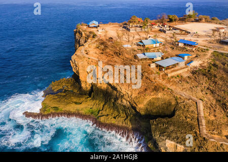 Magnificent view of unique natural rocks in Angel's Billabong beach located in the east side of Nusa Penida Island, Bali, Indonesia. Aerial view. Stock Photo