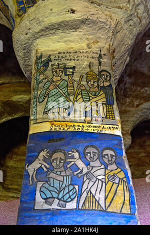 Frescos at the West column in the interior of the orthodox rock-hewn church Abuna Gebre Mikael, above: the Ethiopian Saint Yared and inventor of the E Stock Photo