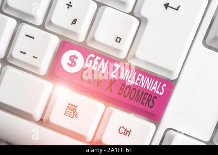 Writing note showing Gen Z Millennials Gen X Boomers. Business concept for Generational differences Old Young showing White pc keyboard with note pape Stock Photo