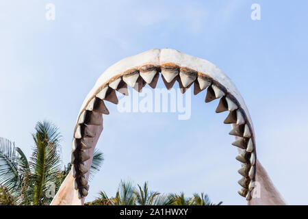 Large great white shark teeth model structure outdoors closeup jaws statue. Stock Photo