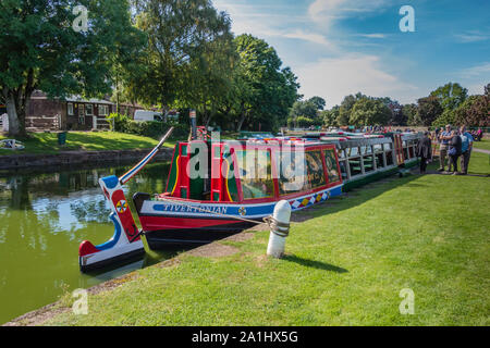 Passengers boarding the canal barge, Tivertonian, for a cruise along the Grand Western Canal from Tiverton, Devon, UK. Stock Photo