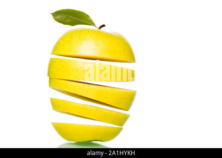 Green apple cut into slices. Stock Photo