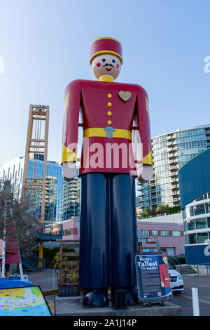 'New Westminster, British Columbia/Canada - 8/3/2019: On the Quay, a Statue of the world's tallest tin solder along the boardwalk in the evening summe Stock Photo