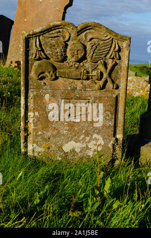 Ancient headstone on a grave at Kirkmadrine Burial Chapel Mull of Galloway Dumfries and Galloway Scotland UK Stock Photo