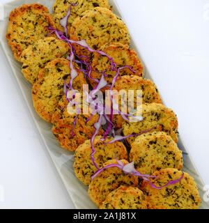 Top view rectangle plate of Vietnamese vegan food, green bean pies, savory dish for vegetarian meal, snack or breakfast Stock Photo