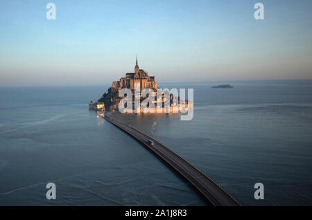 Le Mont Saint-Michel (St Michael’s Mount) in Normandy, north-western France, on 2019/02/22: aerial view of the mount surrounded by water during a spri