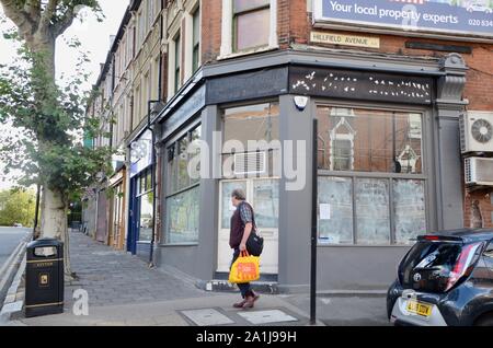 empty and closed down businesses and shops in north london england UK Stock Photo