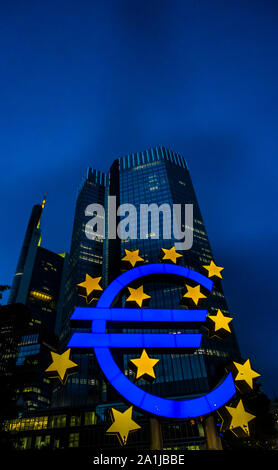 euro sign in front of euro tower, ecb building at night Stock Photo