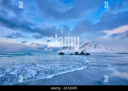 Norwegian Sea waves on rocky coast of Lofoten islands, Norway Stock Photo