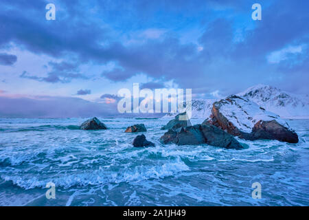 Norwegian Sea waves on rocky coast of Lofoten islands, Norway Stock Photo