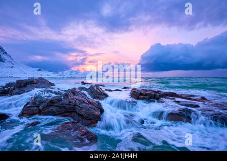 Norwegian Sea waves on rocky coast of Lofoten islands, Norway Stock Photo