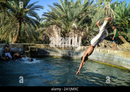 Siwan Berber people, swim at the 'El Arais' host spring. Stock Photo