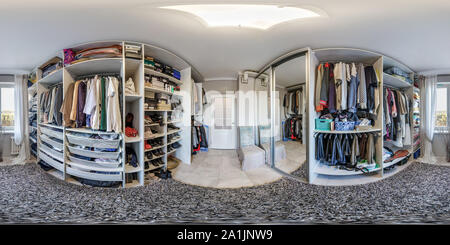 360 degree panoramic view of MINSK, BELARUS - MAY, 2018: full seamless spherical hdri panorama 360 degrees angle in interior of big wardrobe room in modern apartment in equirectan