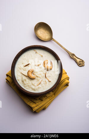 Rice Kheer or Firni or Chawal ki Khir is a pudding from Indian subcontinent, made by boiling milk ,sugar and Rice. Served in a bowl Stock Photo