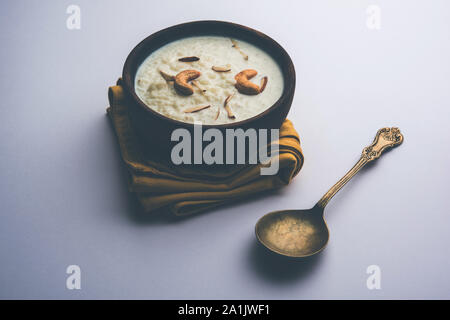 Rice Kheer or Firni or Chawal ki Khir is a pudding from Indian subcontinent, made by boiling milk ,sugar and Rice. Served in a bowl Stock Photo