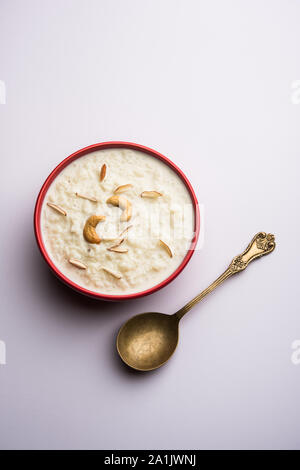 Rice Kheer or Firni or Chawal ki Khir is a pudding from Indian subcontinent, made by boiling milk ,sugar and Rice. Served in a bowl Stock Photo