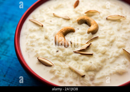 Rice Kheer or Firni or Chawal ki Khir is a pudding from Indian subcontinent, made by boiling milk ,sugar and Rice. Served in a bowl Stock Photo