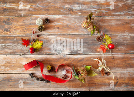 background with autumn leaves  laid on wooden table Stock Photo