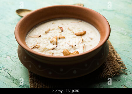 Rice Kheer or Firni or Chawal ki Khir is a pudding from Indian subcontinent, made by boiling milk ,sugar and Rice. Served in a bowl Stock Photo