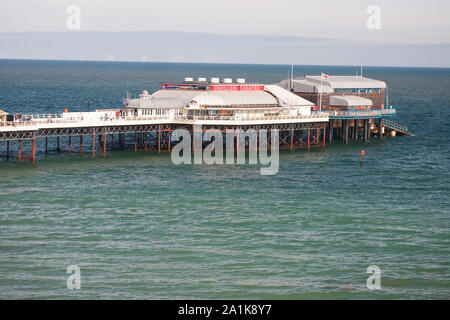 Cromer pier (1902) in North Norfolk, it still has live shows in its Pavilion Theatre, has been used in films and is home to the Cromer Lifeboat Stock Photo