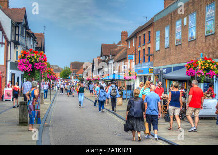Tourists walking along Henley Street in Stratford-Upon-Avon UK Stock Photo