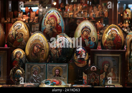 Painted eggs with religious themes in a Prague storefront Stock Photo