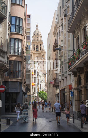 View of Murcia Cathedral Bell Tower along the Calle de la Frenaria. Stock Photo