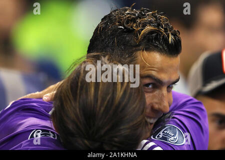 Cristiano Ronaldo of Real Madrid embraces with his mother, Maria Dolores dos Santos Aveiro after winning the UEFA Champions League - Juventus v Real Madrid, UEFA Champions League Final, National Stadium of Wales, Cardiff - 3rd June 2017. Stock Photo