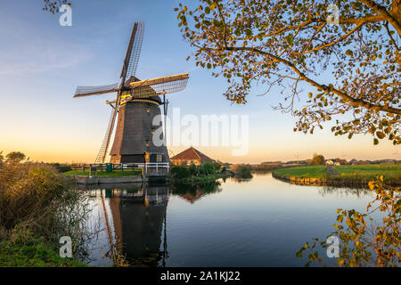 Classic view of the Dutch countryside with windmill in Groene Hart, between cities of Gouda and Leiden, Netherlands Stock Photo