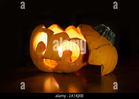 Smiling Little Haloween Pumpkin Face Stock Photo