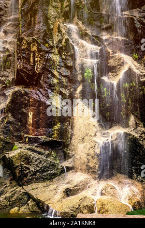 Waterfall Landscape with water falling from the top of the mountain Stock Photo