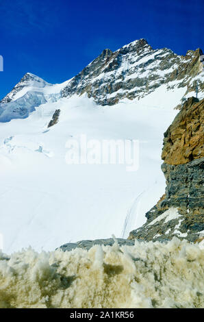 Alps Eiger and Jungfrau dramatic snowy mountain peaks panorama Switzerland. Stock Photo